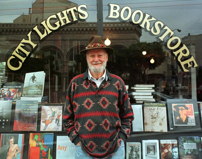 FILE PHOTO: Lawrence Ferlinghetti stands outside his bookstore in San Francisco